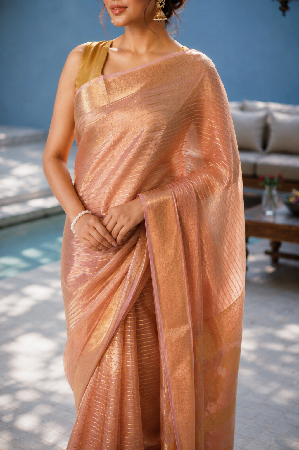 Women's Peach Silk Tissue Saree with Unstitched Blouse