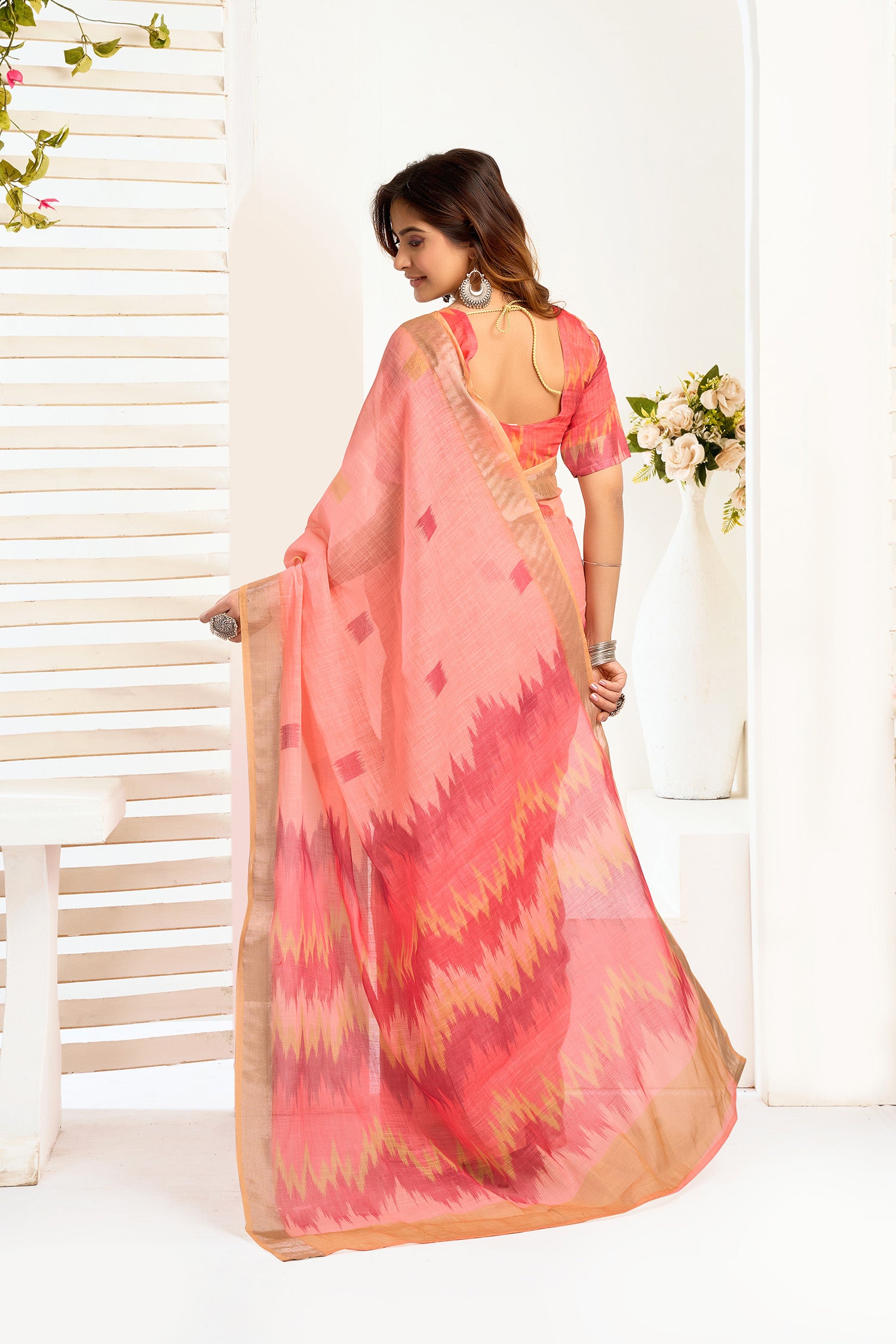 Women Peach Linen Ikkat Saree