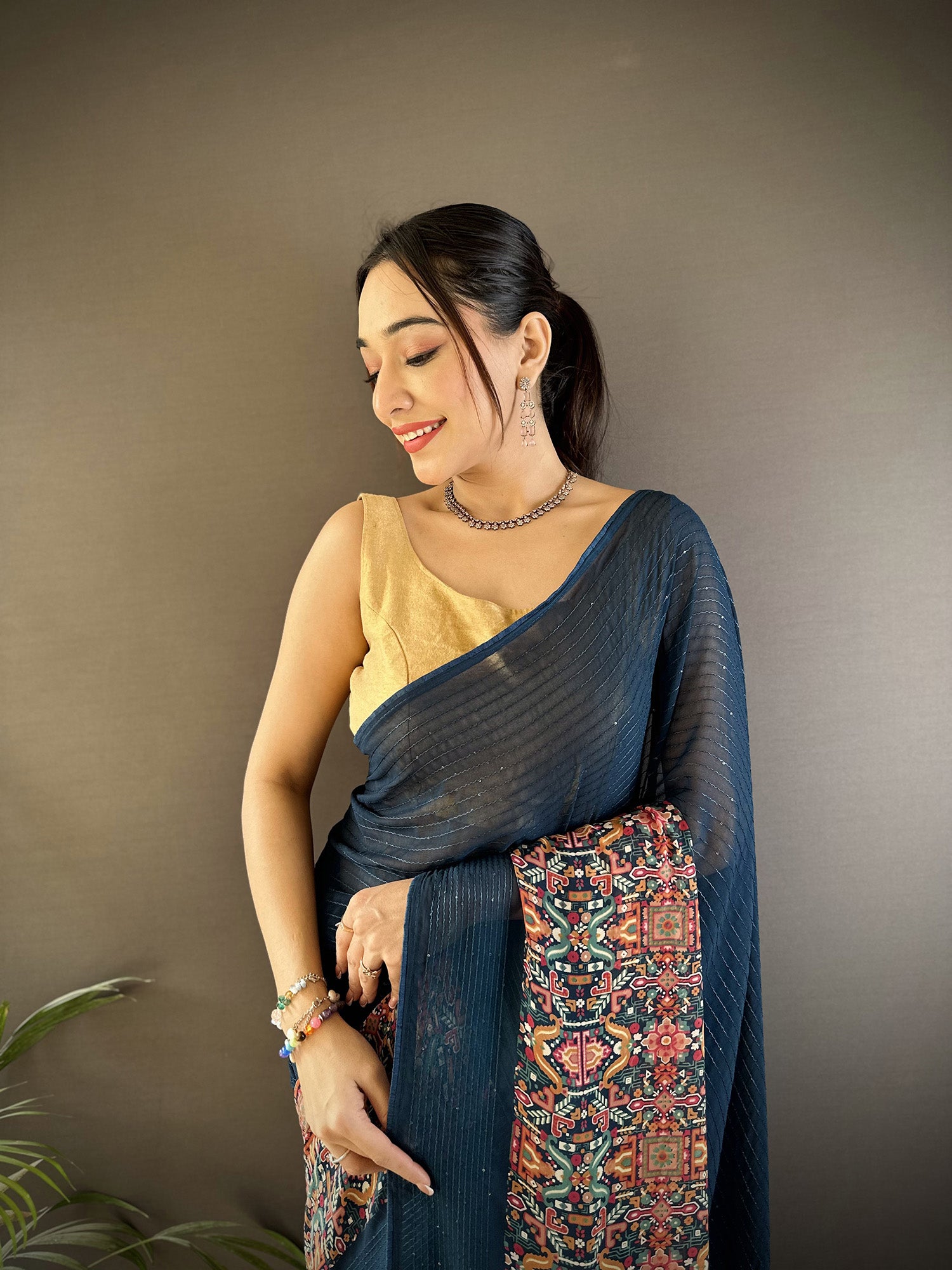 Women Georgette Blue Attractive Foil Print Saree with unstitched blouse