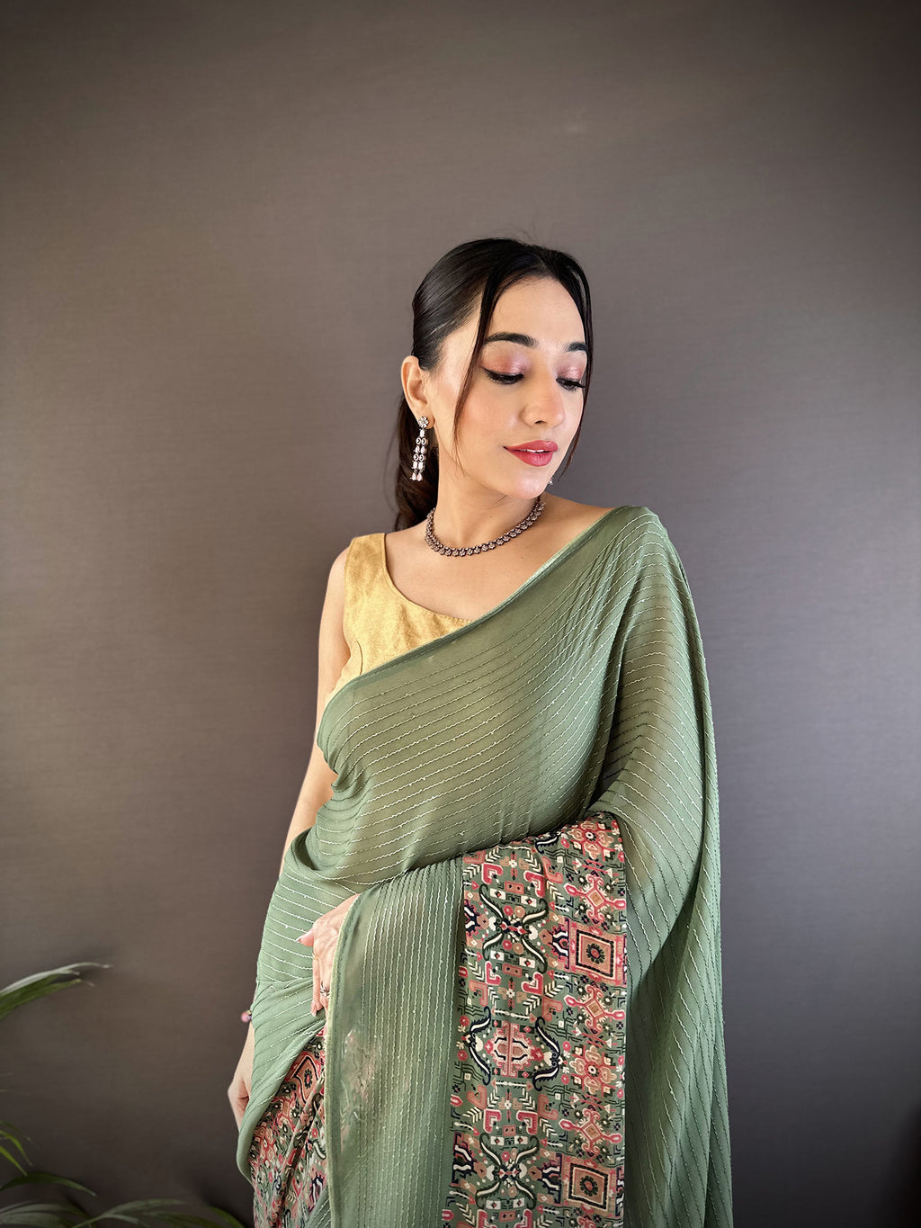 Women Georgette Mehendi Green Attractive Foil Print Saree with unstitched blouse