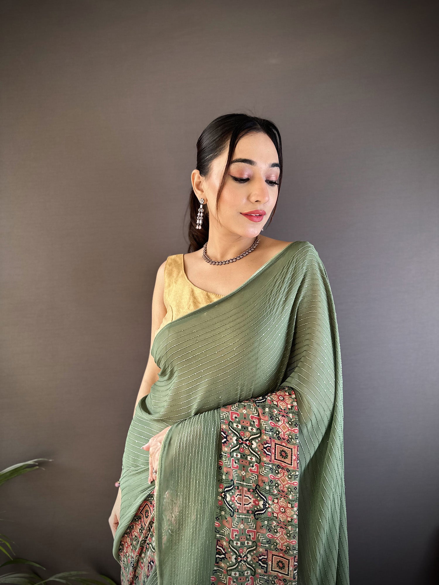 Women Georgette Mehendi Green Attractive Foil Print Saree with unstitched blouse