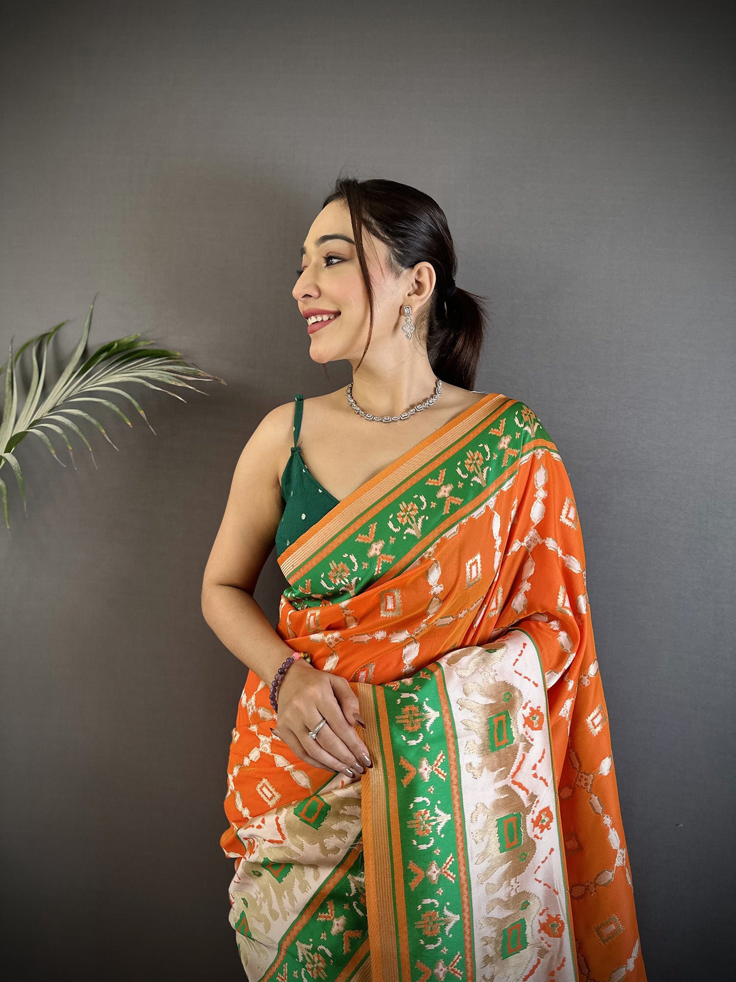 Women Banarasi Silk Orange Motifs Inspired By Nature Saree with unstitched blouse