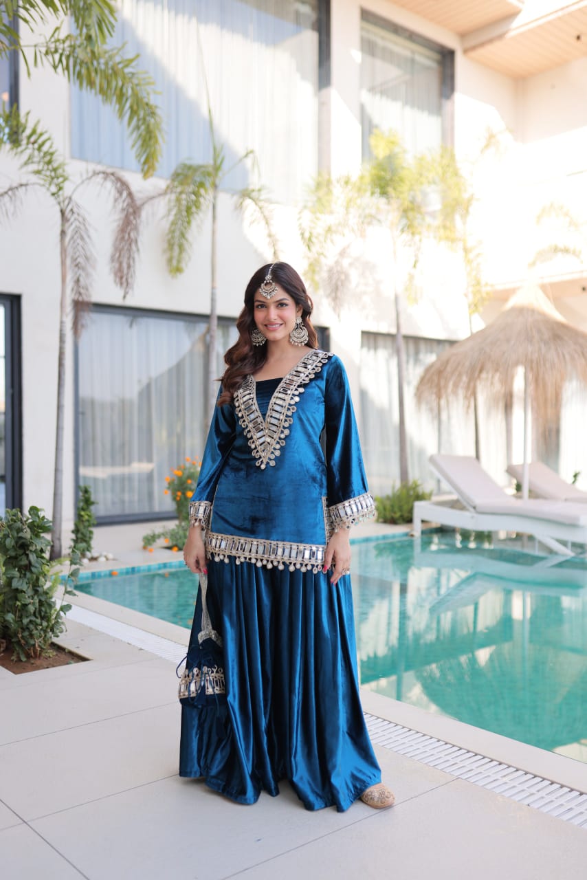 Women Velvet Blue Sequence embroidery work Kurta Set with Potli Bag