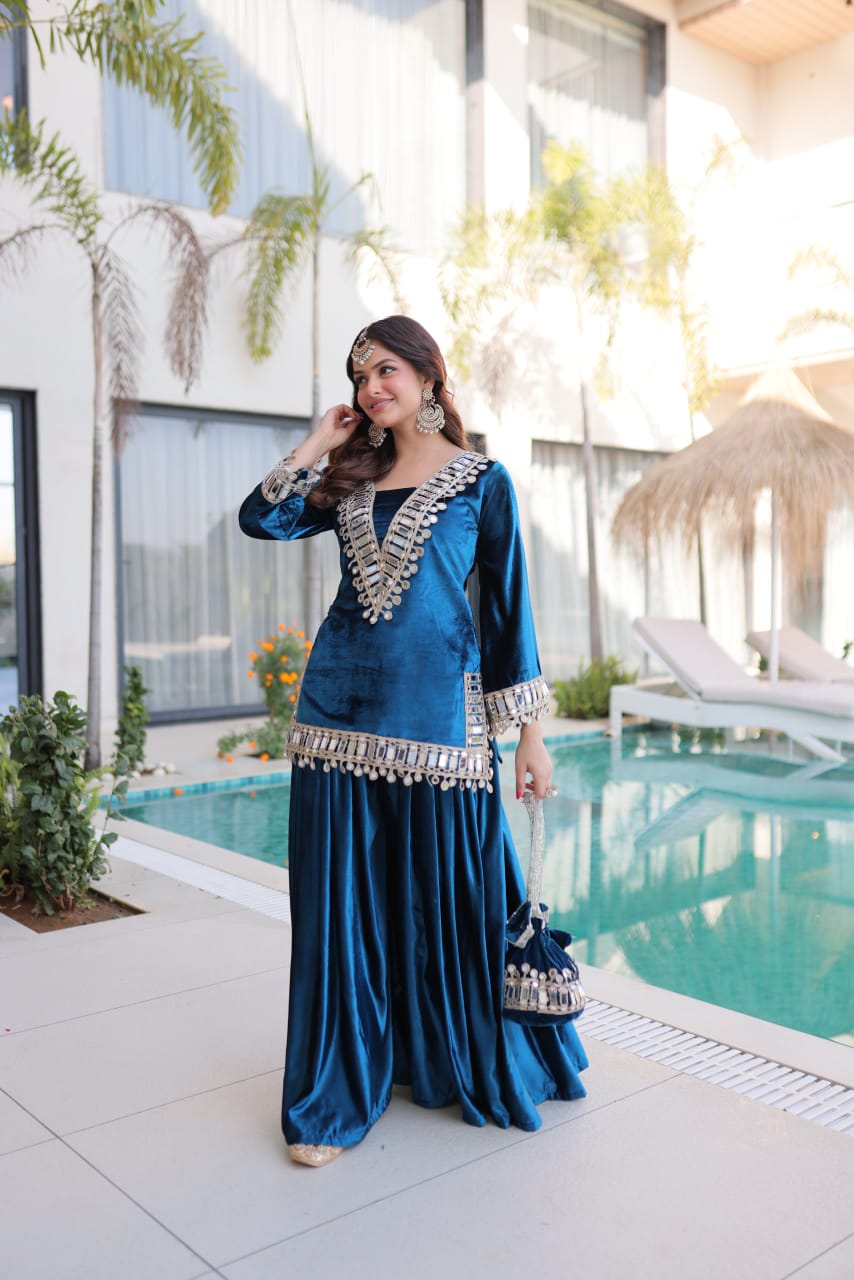 Women Velvet Blue Sequence embroidery work Kurta Set with Potli Bag